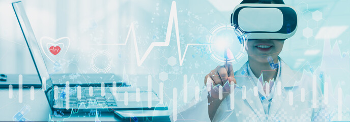 Doctor wearing vr glasses strategy medical business,concept online marketing business medicine,healthcare,insurance,stock graph and diagram,medical examination analytics report,banner panoramic header