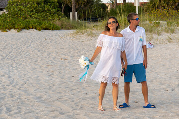 Middle age couple at Florida beach wedding