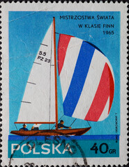 POLAND-CIRCA 1965 : A post stamp printed in Poland showing a sailboat with a spinnaker. World...