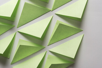 folded green paper squares organized in a pattern