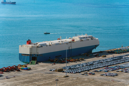 Anchored car carriers and imported cars.