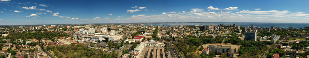 Fototapeta na wymiar Panorana of center city with sea port background in Odessa Ukraine. Drone footage, morning time..