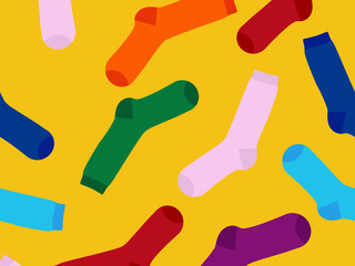 Multi-colored socks on a yellow background