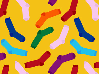 Multi-colored socks on a yellow background
