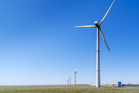 Wind turbines in the spring steppe. the picture was taken in Russia, in the Orenburg region