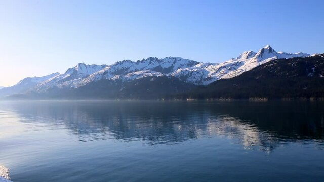 Scenic View Of Sea And Mountains On Sunny Day During Winter - Whittier, Alaska