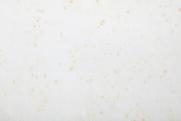 Old white paper with beige stains and filigree texture background