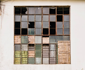 building with broken windows on Grunge Abstract Background