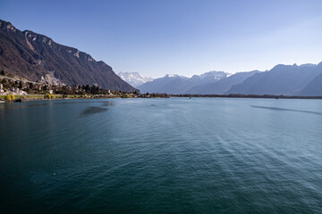 Montreux, Switzerland 04.04.2021 - View from Chillon Castle, Lake Geneva and the Alps in the background