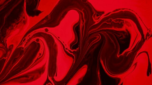 Fluid art painting video, modern acryl texture with flowing effect. Liquid paint mixing artwork with splash and swirl. Detailed background motion with red, black and orange overflowing colors.