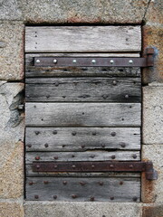 Old wooden plank door closeup