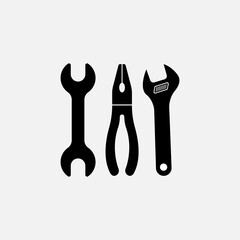 Tools of black color. Wrench, screwdriver and hammer icon on white background