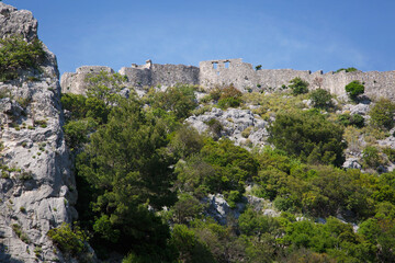 Fototapeta na wymiar Stone wall of the old fortress Hai Nehai, Montenegro.
