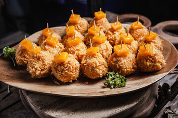 The cheese spread is ball-shaped, usually served at Christmas in the United States and Canada. top view