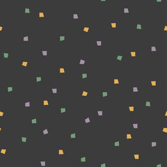 Multicolored  polka dots, blots are scattered in disorderly manner on dark background. Seamless background for design.