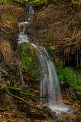Obraz premium Small waterfall near Lisci valley in spring color day