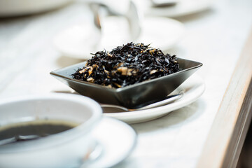 Asian inspired herbal black goji garnish