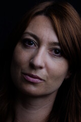 Fototapeta premium Caucasian woman portrait with black background