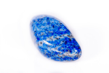 Macro mineral stone blue lapis lazuli (afghanistan) on white background
