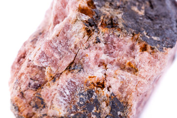 Fototapeta premium macro mineral andalusite stone on a white background