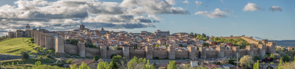 Majestic panoramic view of Ávila city Walls & fortress, full around view at the medieval historic city