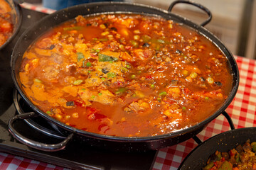 Paella preparation at the stre.et market in Las Ramblas near Barcelona Cathedral square.