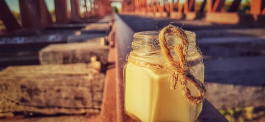 soy wax candle on train tracks, vintage old rust