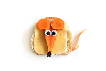 Food art creative concepts. Cute mouse made of cheese, bread and carrots vegetables isolated on a white background.