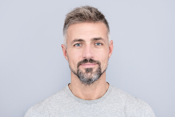 Fototapeta premium mature handsome man portrait with grizzled beard hair, male beauty