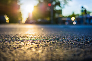 Sunny day in a city, view from road on the sunset in the city