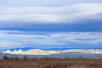 Fantastic colors over Mono Lake with lenticular clouds moving over it at a twilight