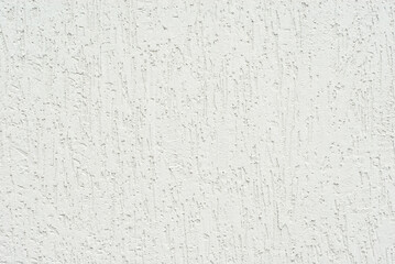 Plaster on a white wall. Concrete wall texture close up.