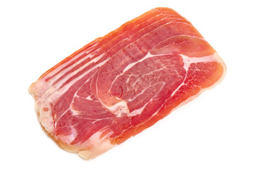 Spanish jamon iberico (serrano ham), isolated on white background. High resolution image.