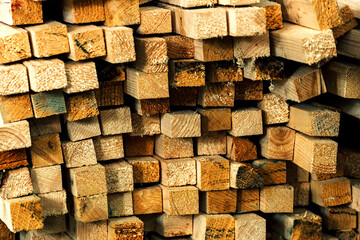 The ends of the wooden bars. Background or screen saver for a wood construction materials supplier.