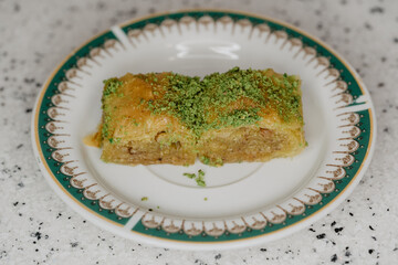 Traditional Middle Eastern Flavors. The local name of Baklava is Fıstıklı Baklava. Close up.