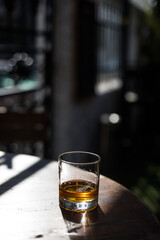 Whisky glass on a wooden surface