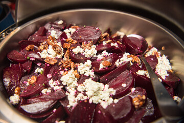 Beet salad with feta cheese and pecans. Top view