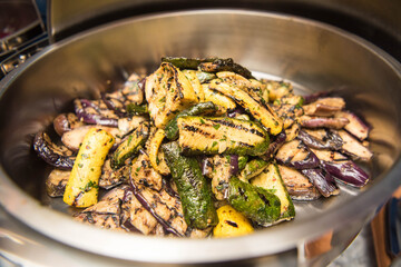 Grilled egglplant in large serving bowl.