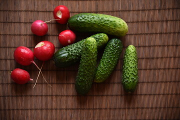 Fresh vegetables cucumbers and radishes