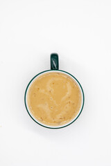 conceptual photo of a cup of coffee on white background, top view	
