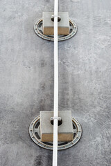 Lightning conductor on a concrete footing. - obrazy, fototapety, plakaty