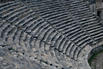 Ancient Roman amphitheater made of stone under the open sky in Pamukkale in Turkey