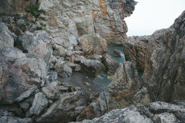 Large boulders near the cliff by the sea