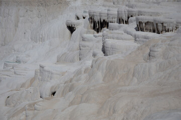 Carbonate mineral left by the flowing of thermal spring calcite-laden waters in Pamukkale