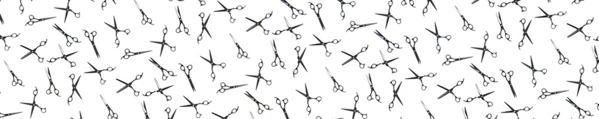 Background of black scissors. professional hairdresser black scissors isolated on white. Black barber scissors, close up. pop art background, for prints or posters. not seamless pattern