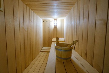 Obraz na płótnie Canvas New Finnish wooden sauna interior