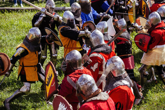 Battle of medieval knights on the battlefield, historical reconstruction