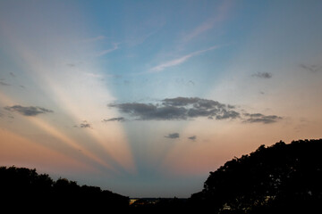 Obraz premium Twilight with sky colored by the rays of the sun in blue and yellow