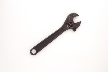 Old rusty Adjustable Wrench on white background.