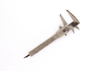Very old used rusty iron calipers isolated on white background.
